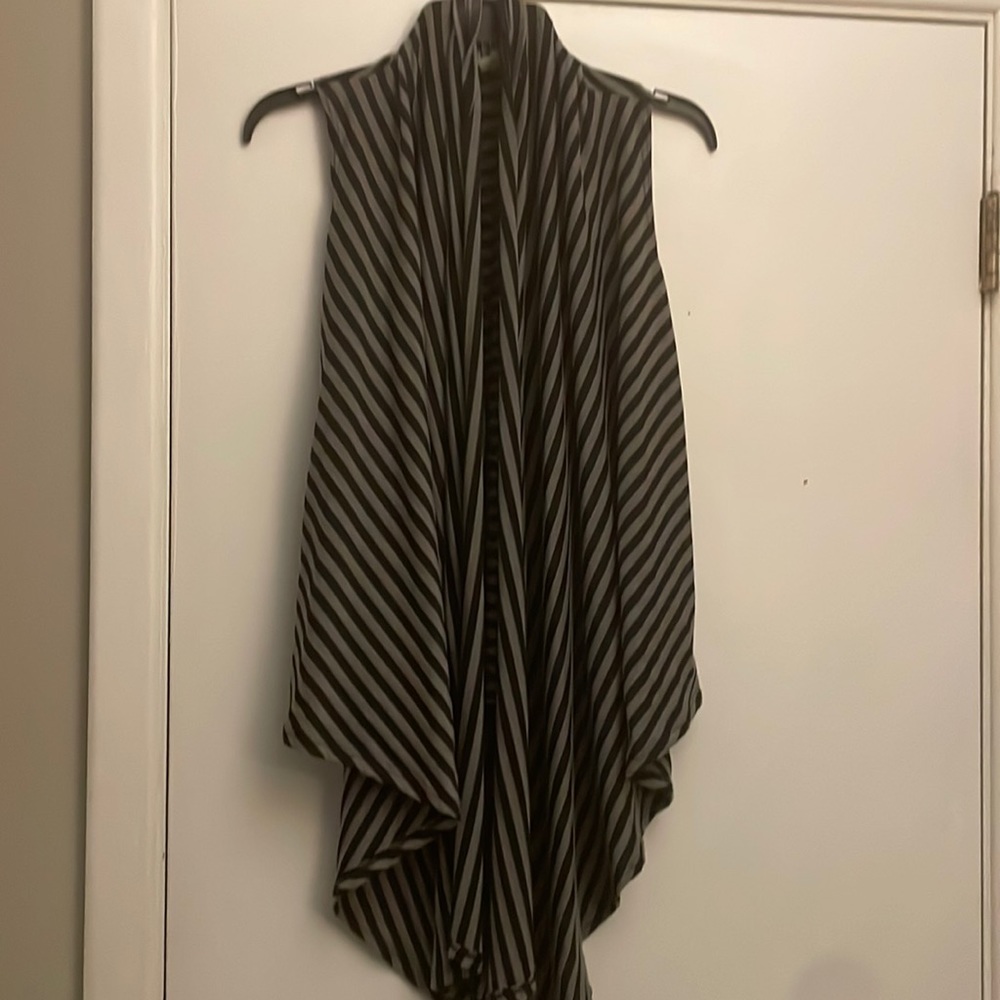 Great layering piece low back with longer front